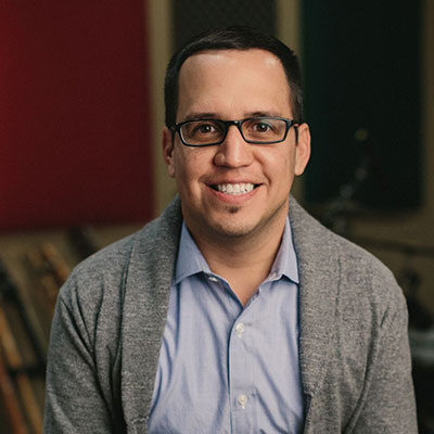 Henry Alonzo and guitarist in the studio